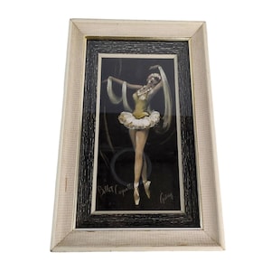May include: A framed painting of a ballerina in a white tutu and yellow bodice, performing on a dark stage. The painting is signed "G. Gray" and titled "Ballet / Operetta".