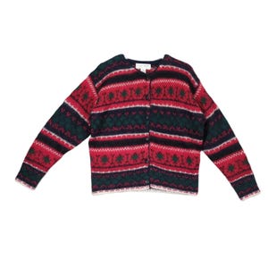 May include: Red, green, and black striped cardigan with a snowflake pattern. The cardigan has a button closure.