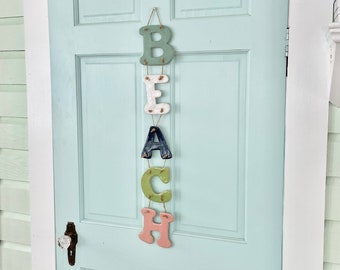 Hanging letter signs