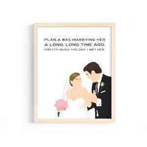 May include: A framed art print with a minimalist illustration of a bride and groom. The bride holds a pink bouquet, and the groom wears a black suit. The text at the top reads: "PLAN A WAS MARRYING HER A LONG, LONG TIME AGO. PRETTY MUCH THE DAY I MET HER."