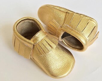 gold baby moccasins