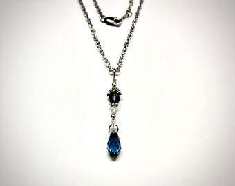 Briolette Cut Crystal, in Denim Blue. Wired with Sterling Silver and Swarovski Beads with a Sterling Silver Chain