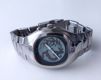 Vintage Fossil Big Tic Dragon Watch: Animated Quartz Wristwatch