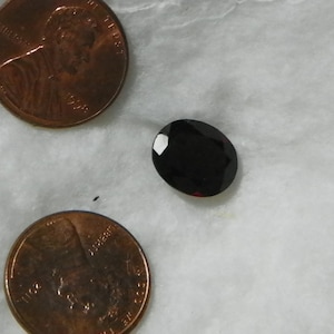 5.06 Carats Garnet 10x12 MM Oval Faceted 9.99x11.93x4.91 MM Eye Clean Very Slight Natural Inclusions Dark Red Purple