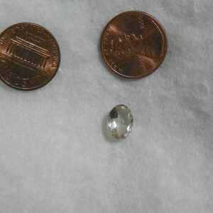 2.04 Cts Danburite 7.5x10.0x3.9 MM Oval Faceted Eye Clean Slight Natural Inclusions White