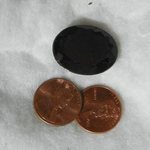 Hessonite 53.11 Carats 19.57x25.44x12.52 MM Oval Faceted Dark Orange Brown Garnet Silky Heavy Natural Flaws