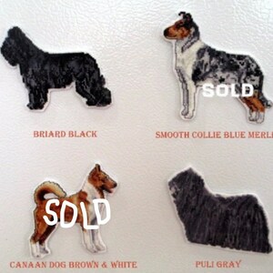 May include: Four embroidered dog breed patches, including a black Briard, a blue merle Smooth Collie, a brown and white Canaan Dog, and a gray Puli. The patches are all marked "SOLD".