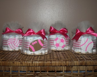 Small diaper cakes for a sports-themed baby shower, pink