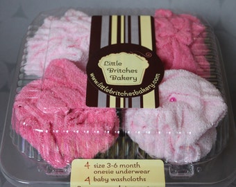 It's a girl: four pack of onesie cupcakes