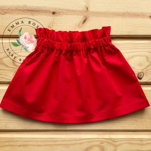 May include: A rustic wooden sign with the text "Welcome to our home" in white lettering. The sign features a distressed finish and a simple, inviting design, perfect for entryway decor.