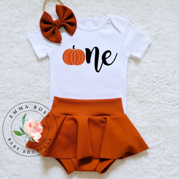 Baby girl pumpkin first birthday outfit with a matching hair bow, burnt orange skirt with shorts, Fall 1st birthday outfit, skirted bummies