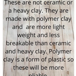 May include: Text on a woodgrain background explaining that the items are made with polymer clay, which is a form of plastic, making them lighter and more pliable than ceramic or heavy clay.
