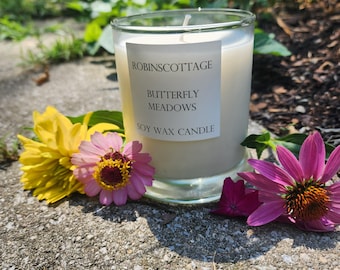 Butterfly Gardens Soy Wax candle, 10oz, clean burning, a light and airy fragrance filled with fresh garden scents. 45 hour burn time.