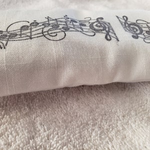 Soothing Lavender flaxseed eye pillow, hand stamped white broadcloth fabric, Music staff design, black ink,relaxation,aromatherapy
