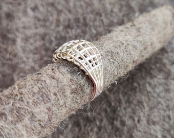 Sculptural silver statement ring made of intricate wires