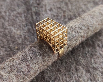 Gold geometrical statement ring with squares design in 4 layers