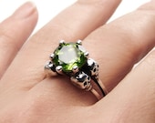 Peridot Skull Ring For Her in Sterling Silver, Unique Goth Engagement Ring