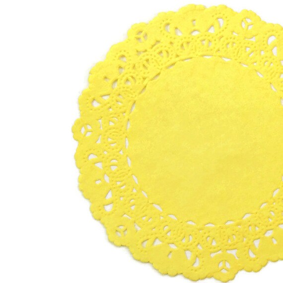 bright yellow paper doilies