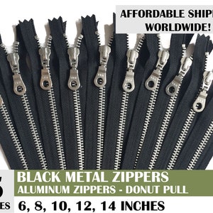 Può includere: Cinque cerniere in metallo nero con tiretti argentati. Le cerniere sono lunghe 15, 20, 25, 30 e 35 cm.  Cerniere in alluminio - Tirador a ciambella.