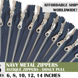 May include: Five navy blue metal zippers with silver teeth and donut pull tabs. The zippers are available in sizes 6, 8, 10, 12, and 14 inches.