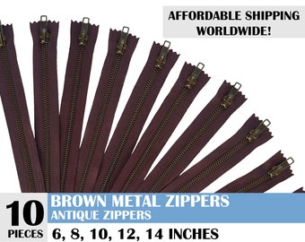 May include: Ten brown metal antique zippers in various sizes, including 6, 8, 10, 12, and 14 inches.