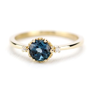 London Blautopas Verlobungsring: 750er Gelbgold, Dreistein Diamantring