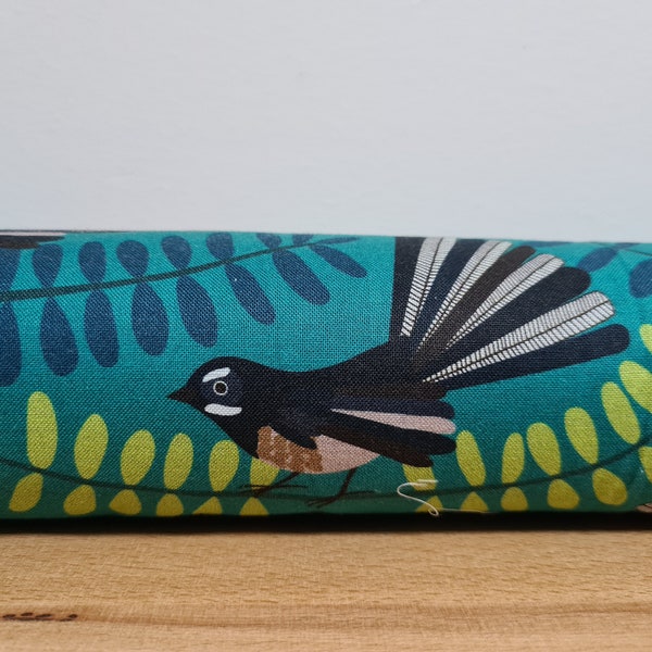 Draft Stopper. Lined. Door or window snake. Draught excluder. home accessory. eco friendly energy saver. Fantail bird. New Zealand birds