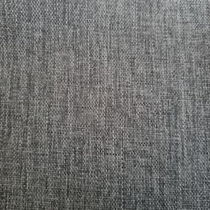 May include: Close-up of a gray textured fabric with a subtle woven pattern.