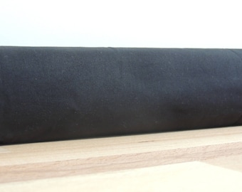 Door draft Stopper. Door or window snake. Draught excluder. House and home accessory.eco friendly energy saver. black draft stopper