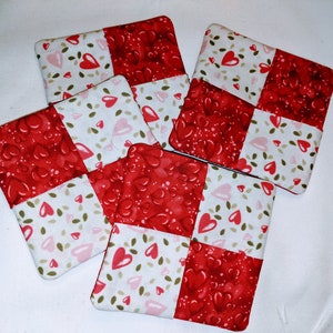 Porta-copos acolchoados com 4 remendos de coração