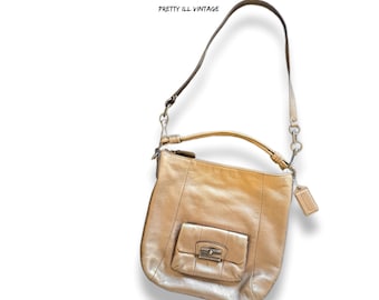 Bolso hobo vintage Kristin con asa superior, color plateado metalizado, de Coach