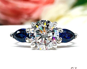 Round CZ & Lab Blue Sapphire 3‑Stone Ring • 8mm Center, Pear Sides, Sterling Silver