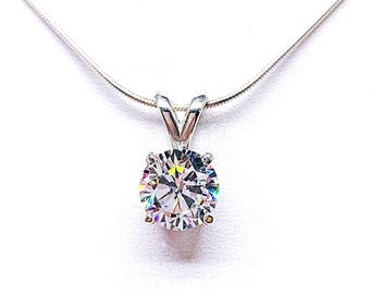 Round-Cut CZ Pendant or Necklace • 5mm—13mm, Sterling Silver