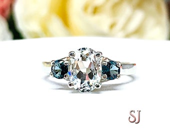 White Topaz 8x6mm Oval with Round London Blue Topaz Ring