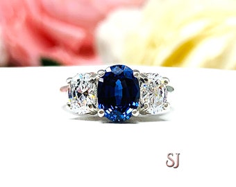 Lab Blue Sapphire and CZ Oval Three Stone Ring