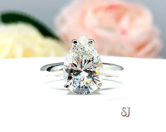 Pear-Cut CZ Engagement Ring • 13x9mm, Sterling Silver, Size 7