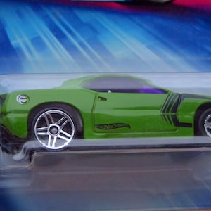 May include: A set of three ceramic mugs with a speckled, matte finish. The mugs are in shades of cream, light gray, and dark gray. Each mug has a simple, minimalist design, perfect for coffee or tea.