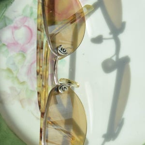 May include: A rustic wooden sign with the text "Welcome to our home" in a handwritten style. The sign features a distressed finish and a simple, inviting design, perfect for a front porch or entryway.