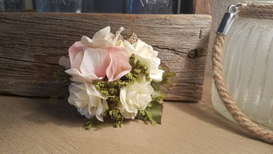 Image of White hydrangea corsage with pink rose