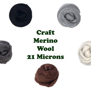 May include: Five bundles of craft merino wool in various colors: black, gray, dark gray, white, and brown. The text "Craft Merino Wool 21 Microns" is displayed in green.