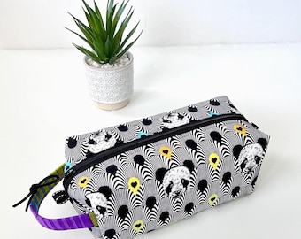 Bolsa de cosméticos con cremallera y asa, diseño de panda, color blanco y negro, ideal para cosméticos y neceseres.