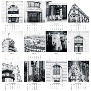 a black and white photo of a building and a clock