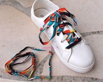 Shoe laces in yellow and red wax fabric