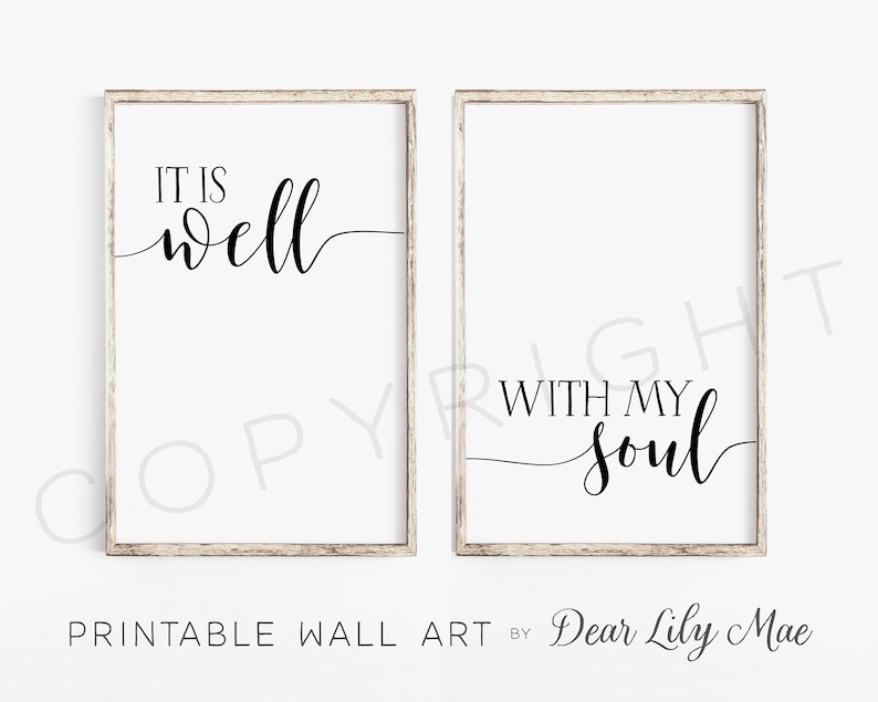 May include: Two framed prints with black calligraphy on a white background. The first print says "It is well" and the second print says "With my soul".