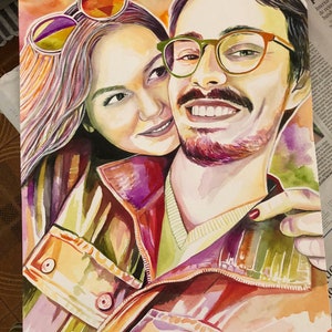 May include: A watercolor painting of a couple. The woman is wearing sunglasses and a jacket. The man is wearing a green shirt and a jacket. The painting is done in a colorful style with a lot of detail.