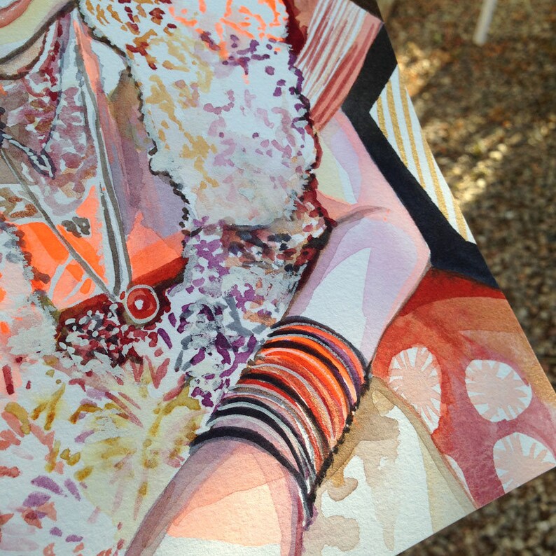 May include: Watercolor painting of a woman wearing a colorful patterned dress and bangles. The woman's arm is bent and her hand is resting on her lap. The background is a soft pink and orange.