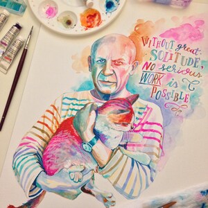 May include: Watercolour painting of a man holding a cat in his arms. The man is wearing a striped shirt and has a watch on his wrist. The cat is pink and white. The background is a watercolour wash of pink, blue, and yellow. The quote "Without great solitude, no serious work is possible" is written in colourful lettering.