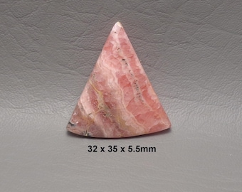 May include: A triangular-shaped, polished gemstone with pink and white banding. The stone measures approximately 1.25 x 1.4 x 0.2 inches. The text "32 x 35 x 5.5mm" is printed on the bottom of the image.
