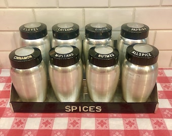 Vintage Kromex Spice Jars with Rack - Spun Aluminum - Bakelite Lids - Raised Lettering - Set of 8 -    Mid Century Kitchen  1950's