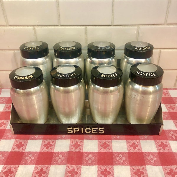 Vintage Kromex Spice Jars with Rack - Spun Aluminum - Bakelite Lids - Raised Lettering - Set of 8 -    Mid Century Kitchen  1950's